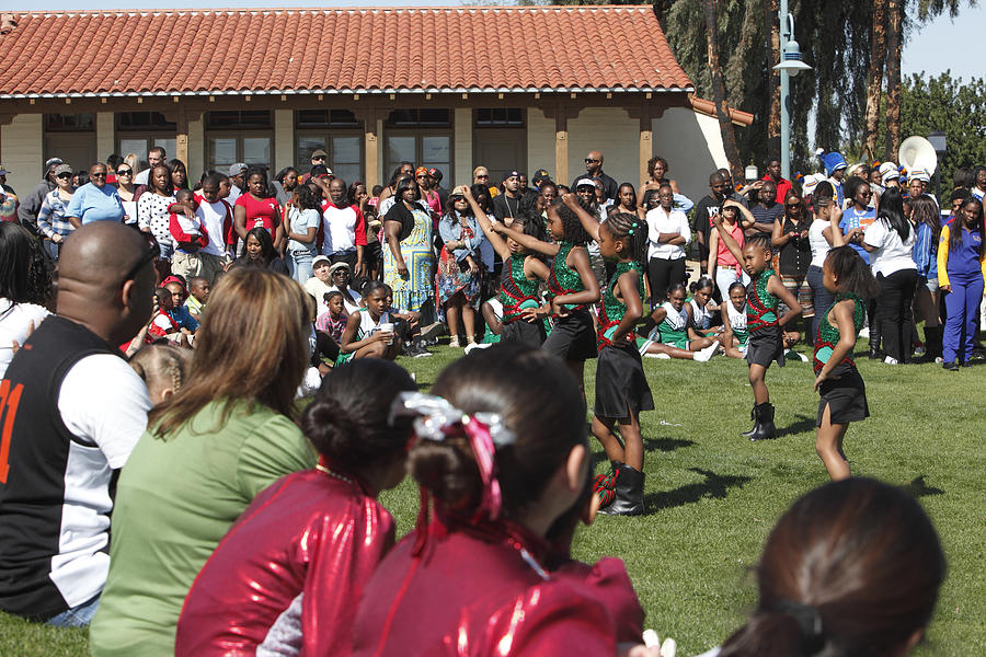 Young Girls Dancing Outdoors At Black History Celebration Photograph by Constantgardener