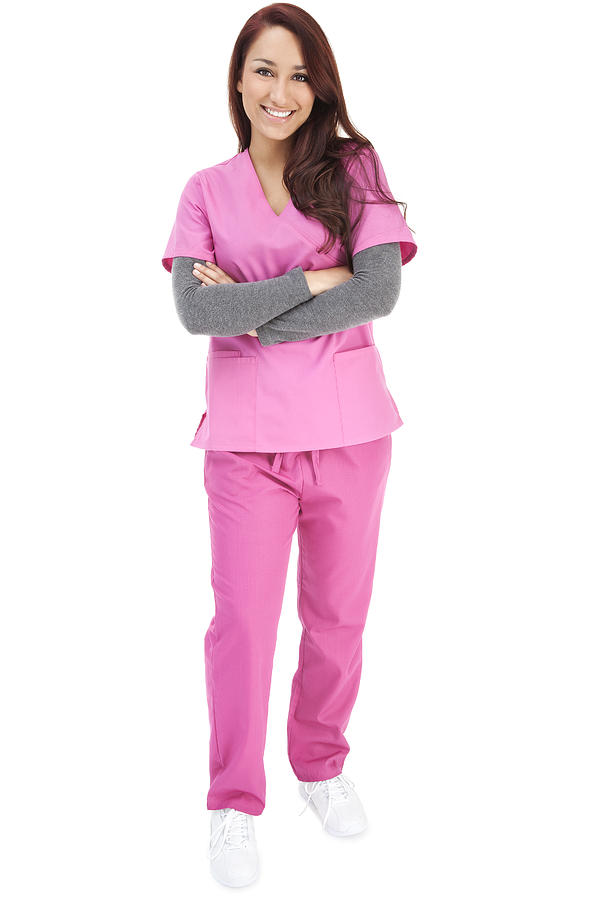 Young Hispanic Nurse in Pink Scrubs Photograph by Jhorrocks