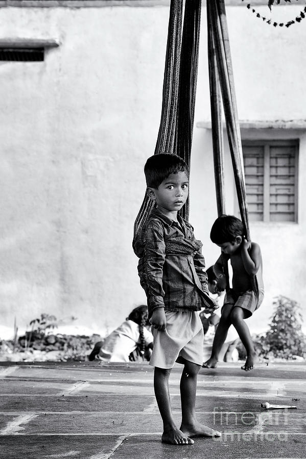 Young Indian Village Boys Playing on Sari Swings Photograph by Tim Gainey