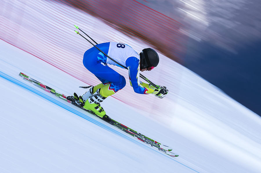 Young Male Skier at Straight Downhill Race Photograph by Technotr