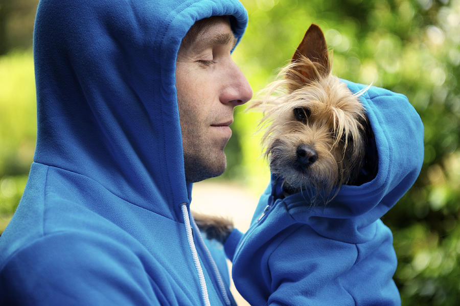 Young Man Best Friend Dog Matching Blue Hoodies Outdoors Park Photograph by PeskyMonkey