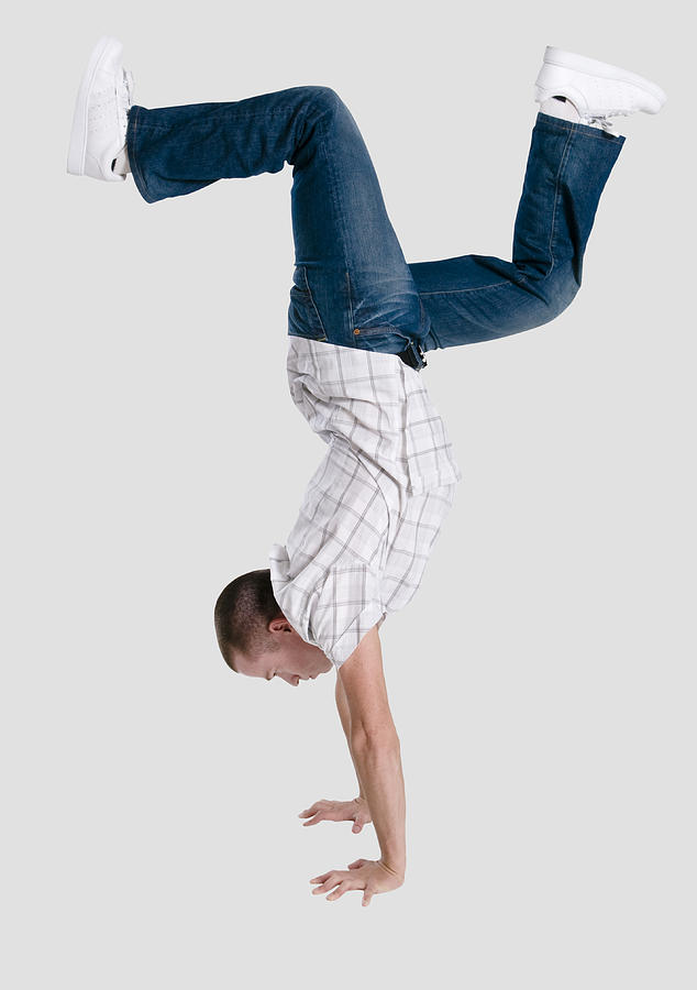 Young Man doing handstand Photograph by RK Studio/Dean Sanderson