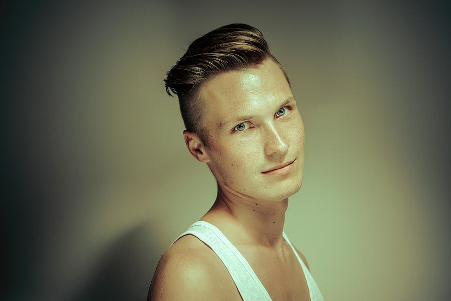 Young man portrait Photograph by Druvo