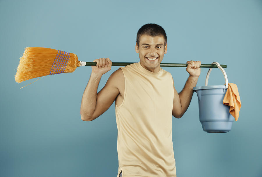 Young man with broom and bucket Photograph by Hill Street Studios