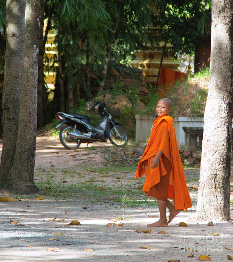Young Monk Smiles Cambodia  Photograph by Chuck Kuhn