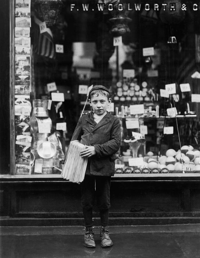 Young Newsboy Outside Woolworths - Lewis Hine - 1910 Photograph by War Is Hell Store