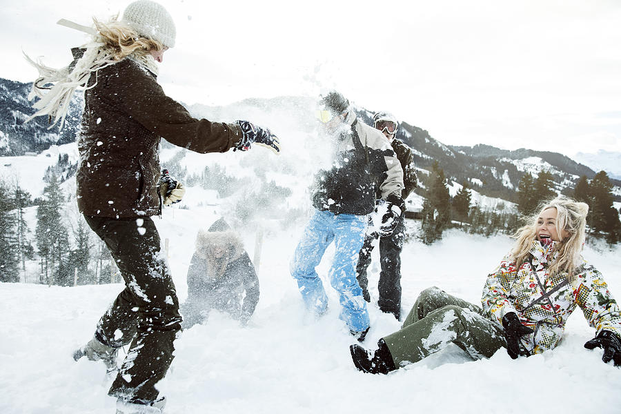 Young People On Winter Holiday, Snowfight Photograph by Henrik Sorensen