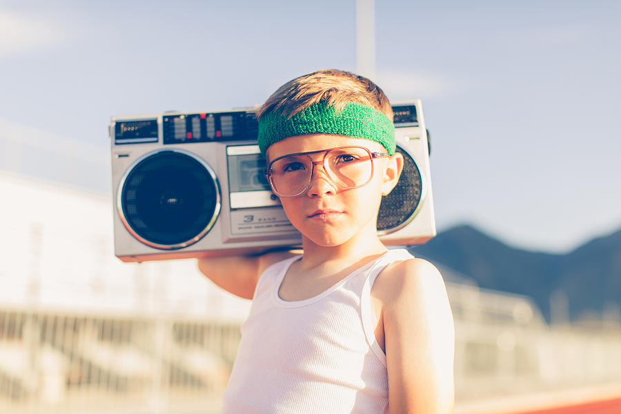 Young Retro Fitness Boy Listening to Music Photograph by RichVintage