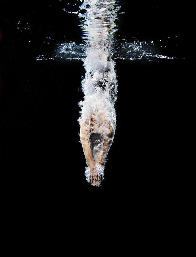 Young swimmer breaking the surface Photograph by Henrik Sorensen