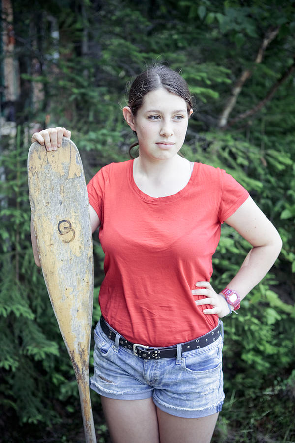 Young teen girl with canoe paddle Photograph by Angela Auclair