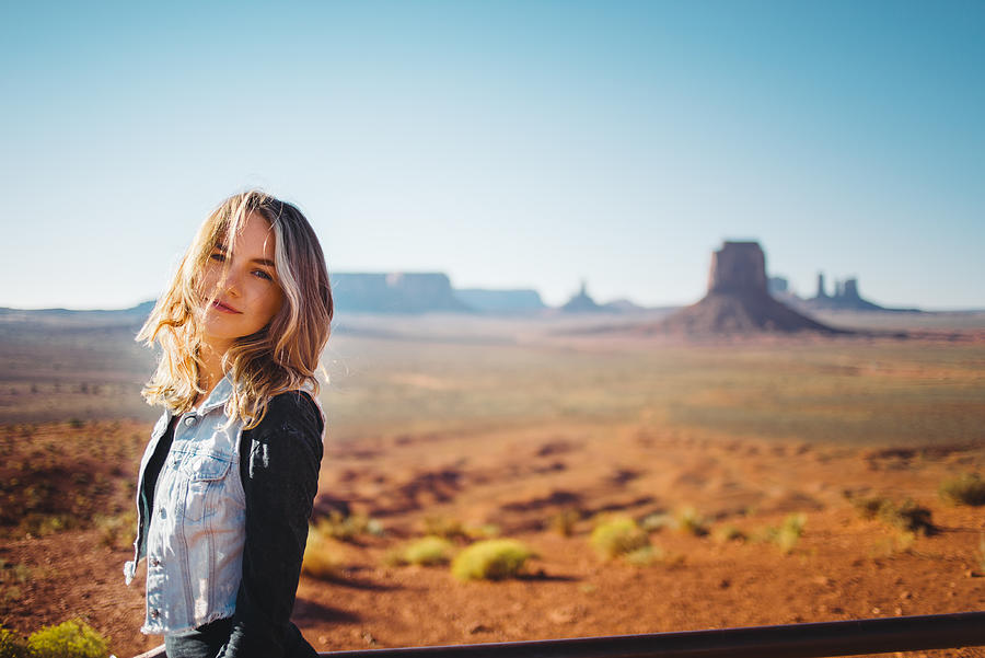 Young woman at Monument Valley Photograph by Xsandra