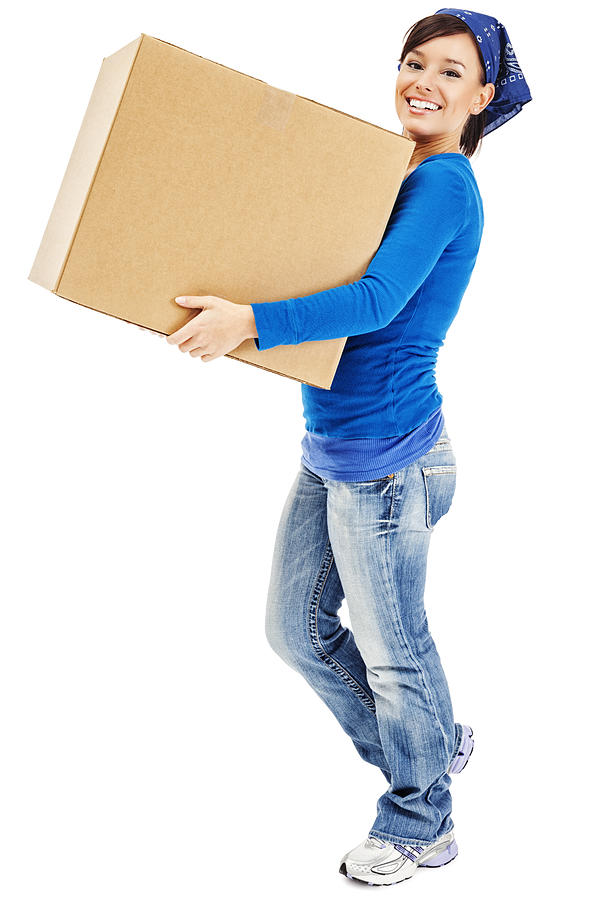 Young Woman Carrying Large Cardboard Moving Box Photograph by Jhorrocks