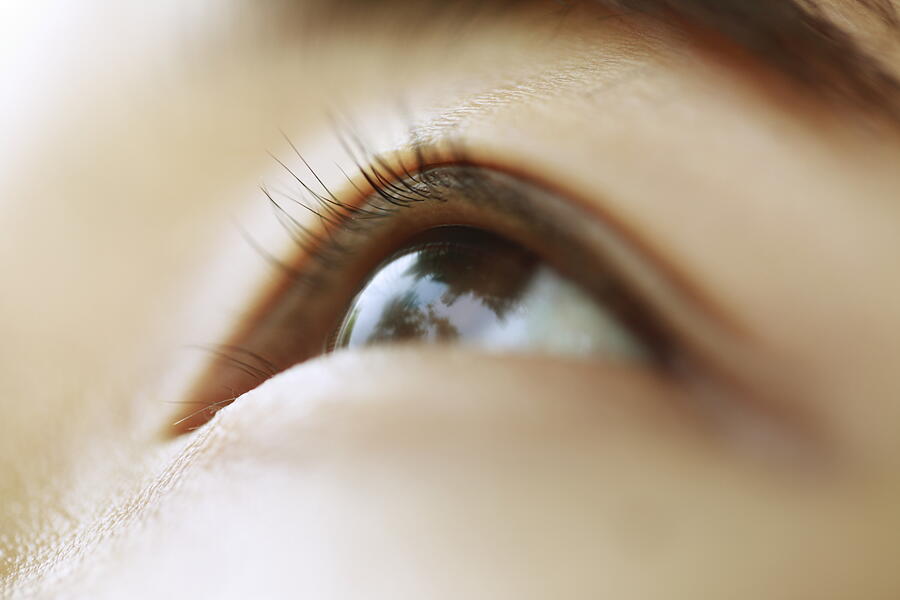Young Woman Eye Close-up Photograph by RunPhoto