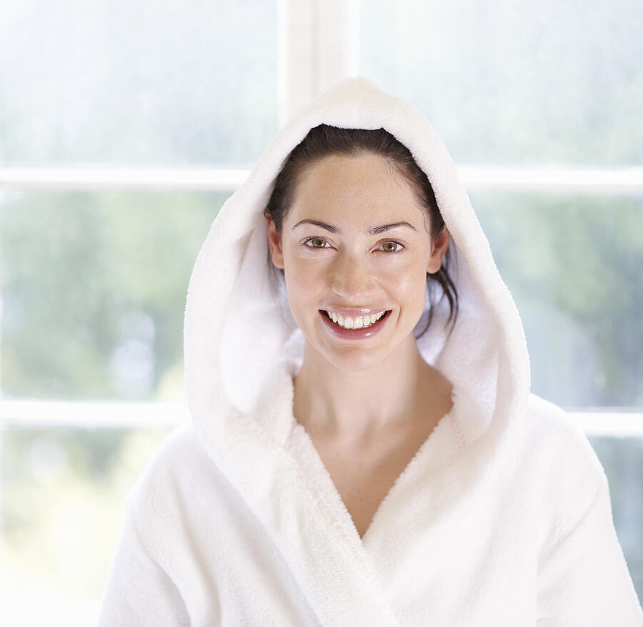 Young woman in bathrobe. Photograph by Dougal Waters