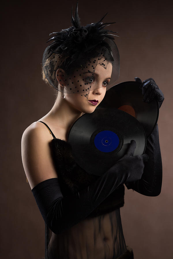 Young woman in retro style with vinyl plate Photograph by AndreyGolubev