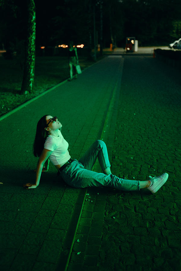 Young woman in sunglasses in neon lighting Photograph by Masha Raymers Young woman in sunglasses in neon lighting Photograph by Masha Raymers