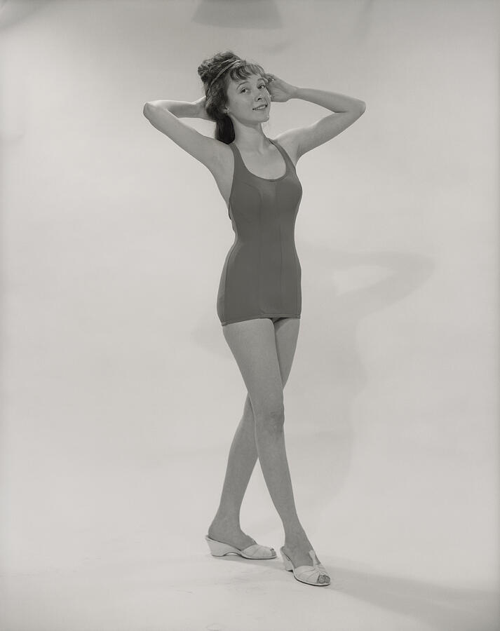 Young woman in swimsuit, portrait Photograph by George Marks