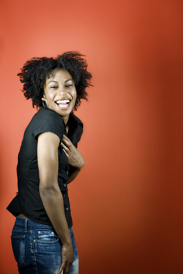 Young woman laughing, portrait Photograph by David Sacks