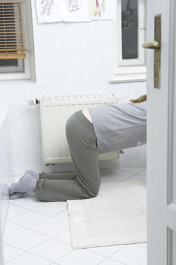 Young Woman Leaning Over Toilet Vomiting Photograph by Bilderlounge