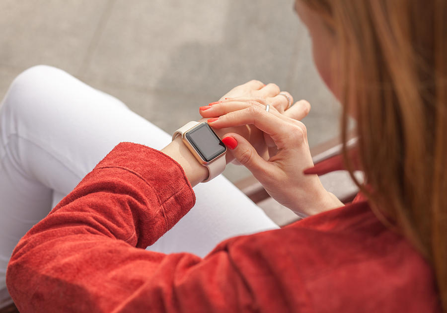 Young Woman Use Smart Watch With Blank Screen Outdoor Photograph by S_Chum