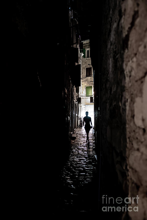 Young Woman Walks Alone Through Spooky Narrow Abandoned Alley In The Night Photograph by Andreas Berthold