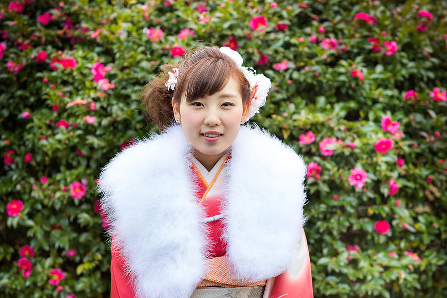 Young woman wearing a kimono and fur collar Photograph by Jonathan Galione