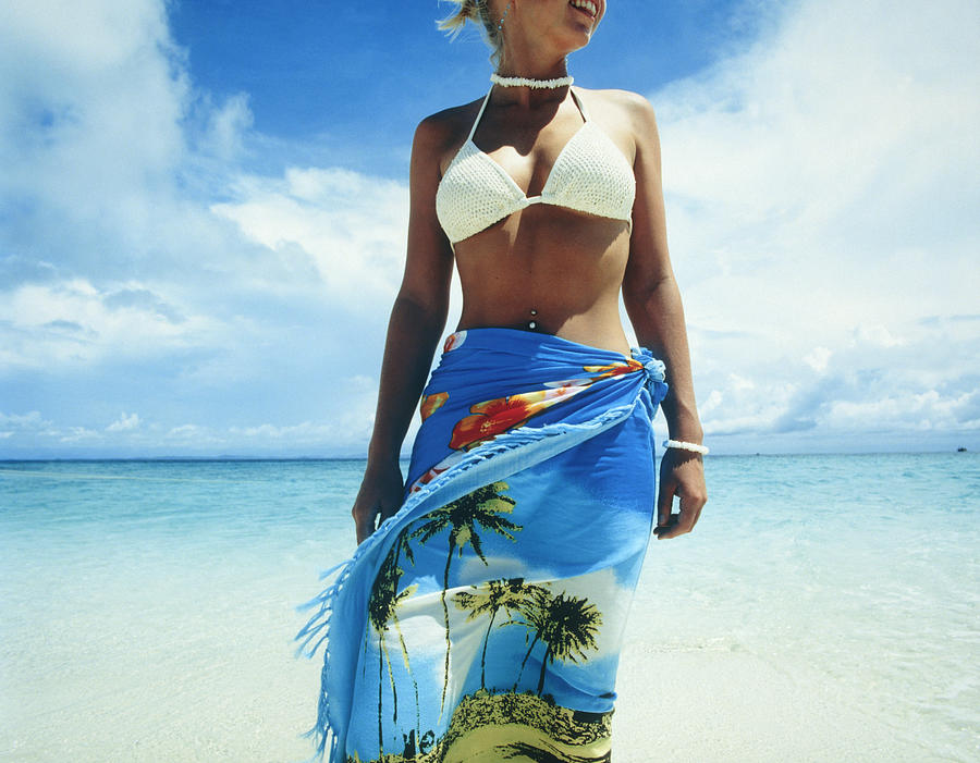 Young Woman Wearing Sarong at Beach Photograph by Hugh Sitton