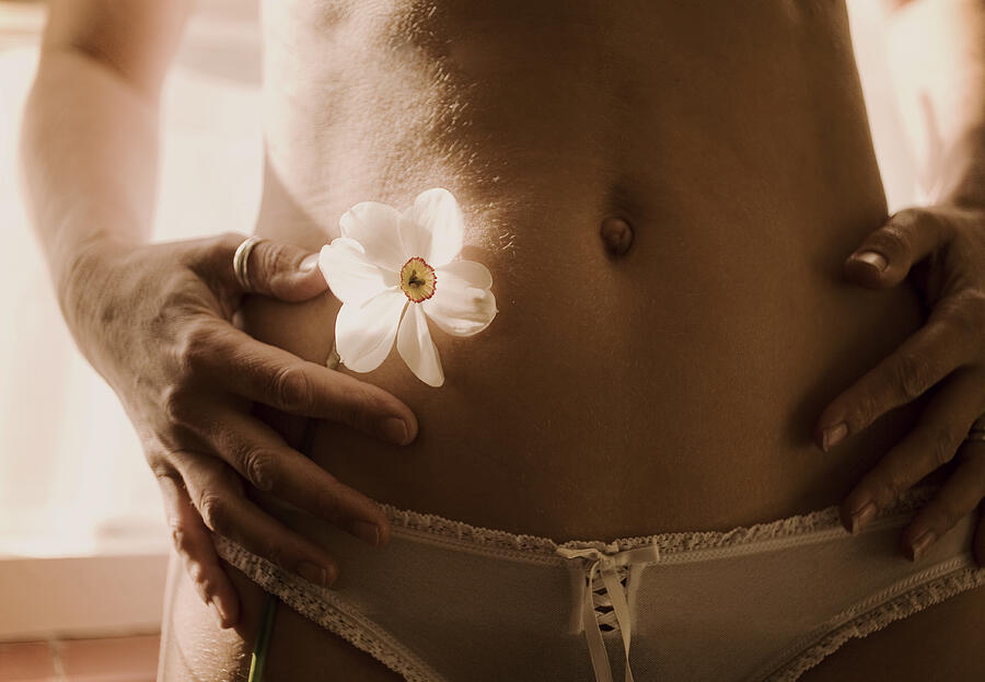 Young Woman with flower in underwear Photograph by Sharon Cooper