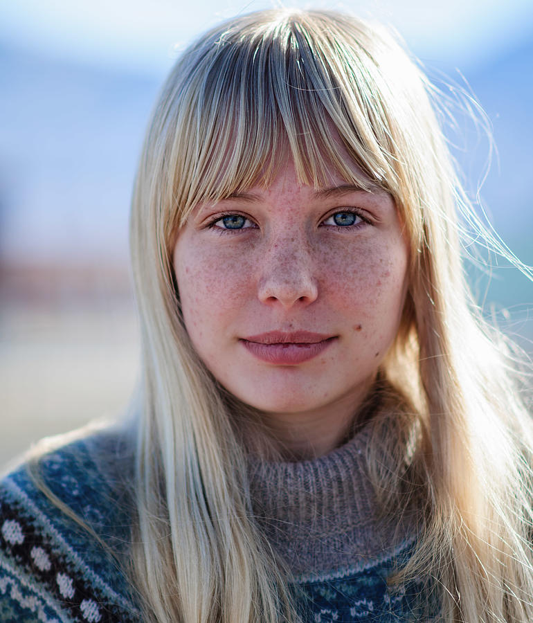 Young woman with freckles. Photograph by Harpazo_hope