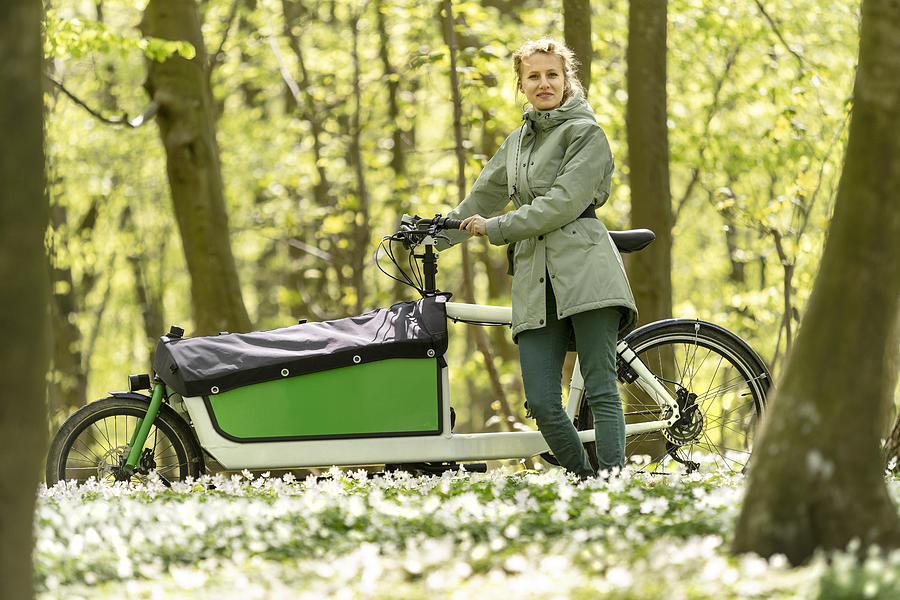 Young Woman With Her Cargo Bike Photograph by Bo Tornvig