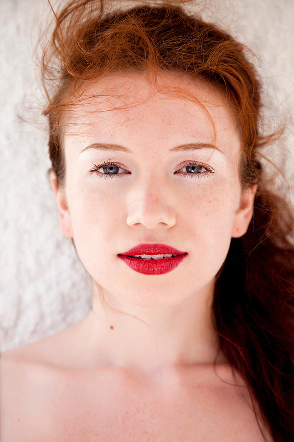 Young woman with red lipstick Photograph by Image Source