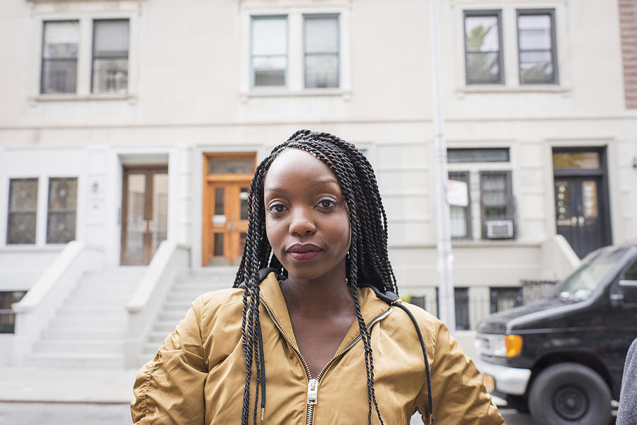 Young young woman in her city neighborhood Photograph by Tony Anderson