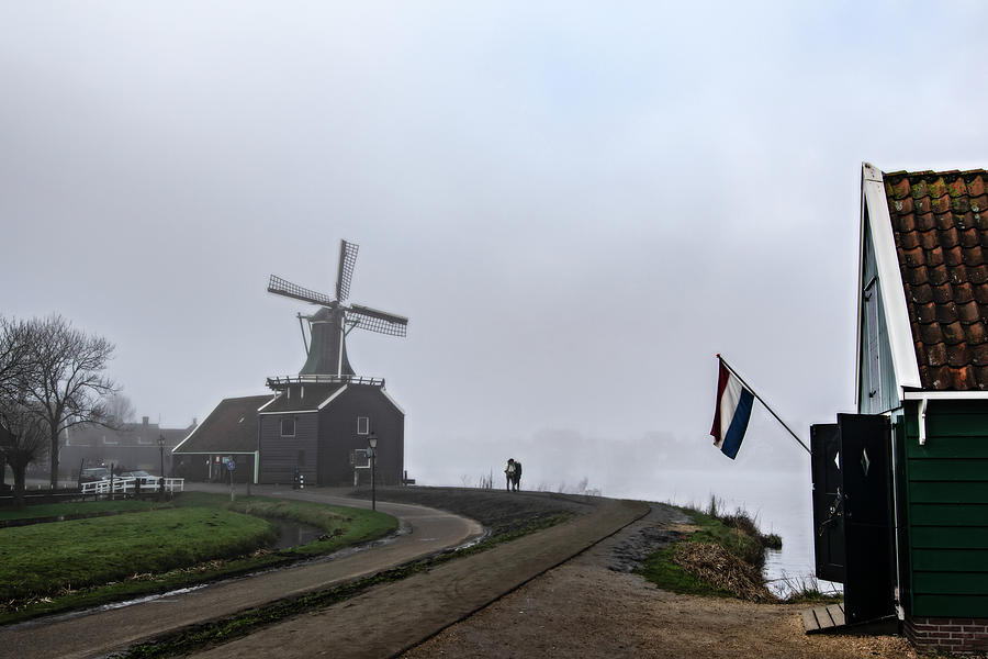Zaanse Schans Windmills In A Foggy Day Photograph by Pedro Cardona Llambias