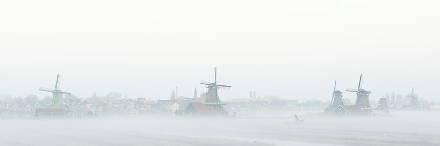 Zaanse Schans windmills in the mist Netherlands Holland Photograph by Sonny Ryse