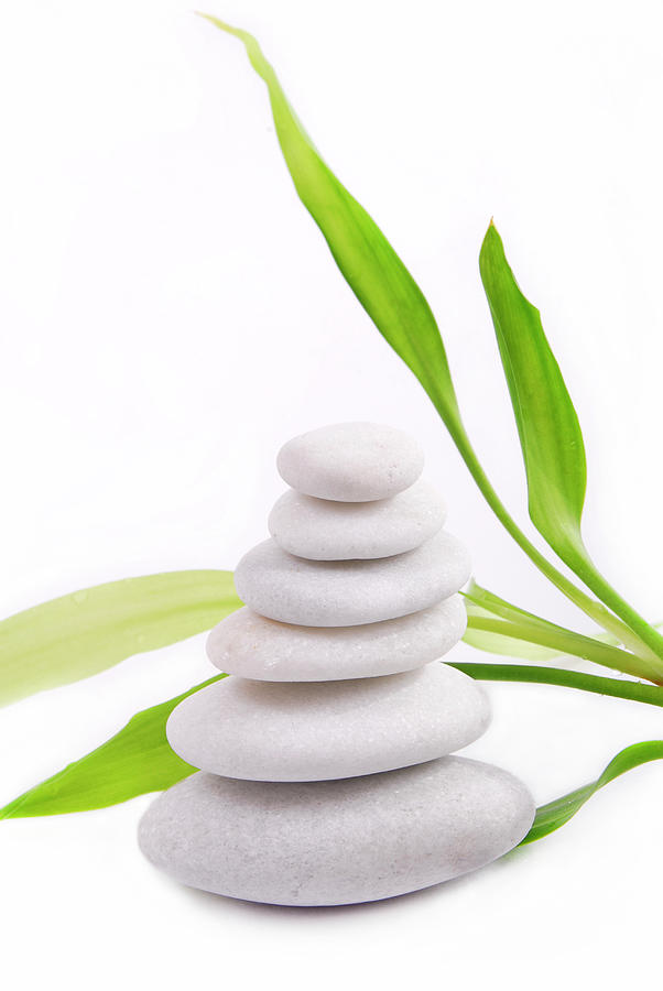 Zen stones with bamboo isolated on white background  Photograph by Severija Kirilovaite
