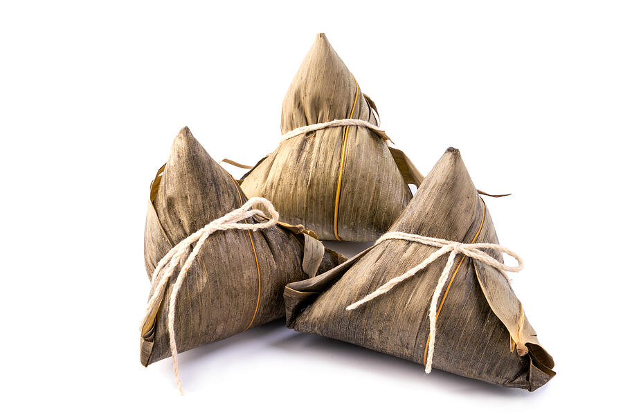 Zongzi, rice dumpling - Design concept of famous food in duanwu dragon boat festival, close up, clipping path, cut out, isolated on white background Photograph by Insjoy