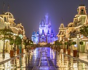 A wet night on Main Street USA Photograph by Wayne Wood