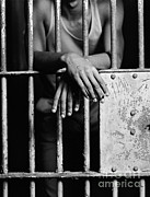 African American Hands Through Bars Photograph by H. Armstrong Roberts/ClassicStock