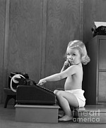 Baby Girl With Adding Machine, C.1940s Photograph by H. Armstrong Roberts/ClassicStock