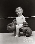 Baby In Boxing Gloves, C. 1930s Photograph by H. Armstrong Roberts/ClassicStock Baby In Boxing Gloves, C. 1930s Photograph by H. Armstrong Roberts/ClassicStock