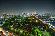 Bangkok skyline at night with Lumphini Park in the foreground Photograph by Miroslav Liska