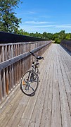 Bicycle on Bridge Photograph by Lucie Dumas