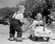Boy Playing Gas Station Attendant Photograph by H. Armstrong Roberts/ClassicStock