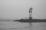 Casting At The Inlet Jetty Photograph by Robert Banach