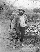 Claude Monet in his garden Photograph by Theodore Robinson