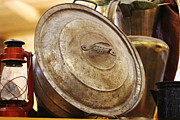 Closeup of Antique Pot and Hurricane Lantern Photograph by Colleen Cornelius