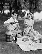 Couple Having A Summer Picnic, C.1950s Photograph by H. Armstrong Roberts/ClassicStock Couple Having A Summer Picnic, C.1950s Photograph by H. Armstrong Roberts/ClassicStock