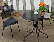 Free seats in a street cafe Photograph by Elena Perelman