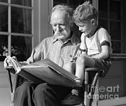 Grandfather Reading To Boy, C.1940s Photograph by H. Armstrong Roberts/ClassicStock