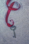 Key Buried In The Sand Photograph by Joana Kruse